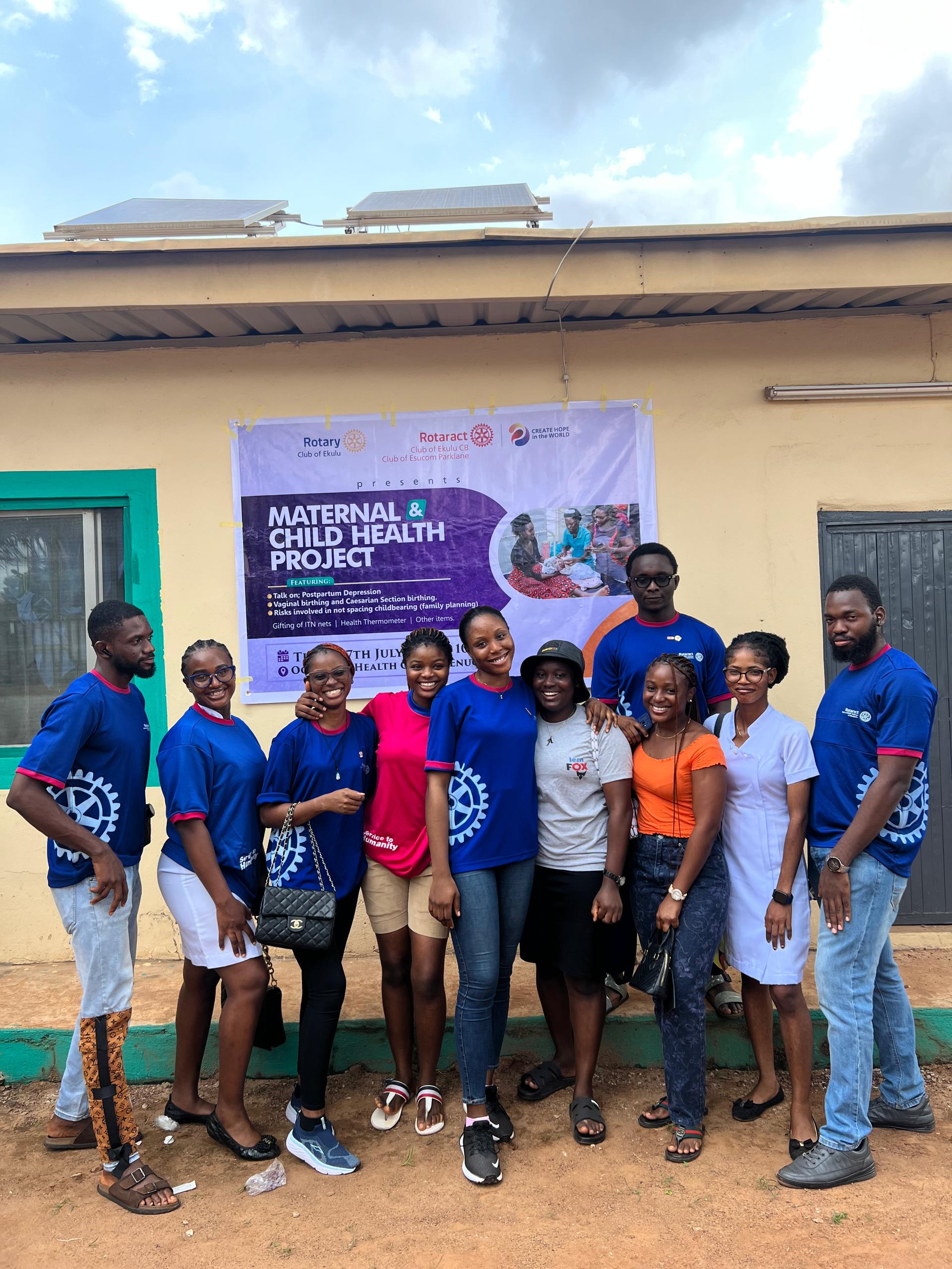 Rotaract team in club shirts at a community project
